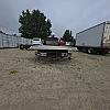 red 2001 International 4700/ Century Tilt Load at Dobson Sales