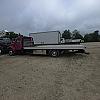red 2001 International 4700/ Century Tilt Load at Dobson Sales
