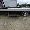 red 2001 International 4700/ Century Tilt Load at Dobson Sales