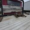 red 2001 International 4700/ Century Tilt Load at Dobson Sales