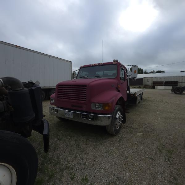 red 2001 International 4700/ Century Tilt Load at Dobson Sales